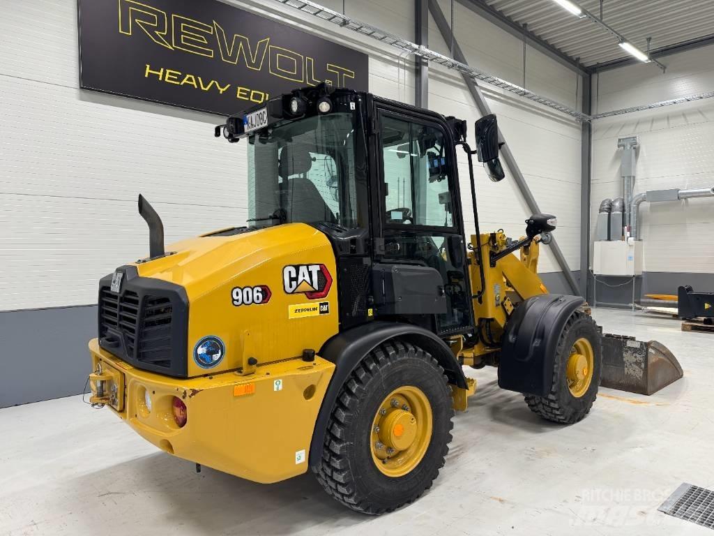 CAT 906 Iekrāvēji uz riteņiem