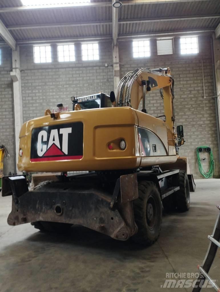 CAT M 316 D Ekskavatori uz riteņiem