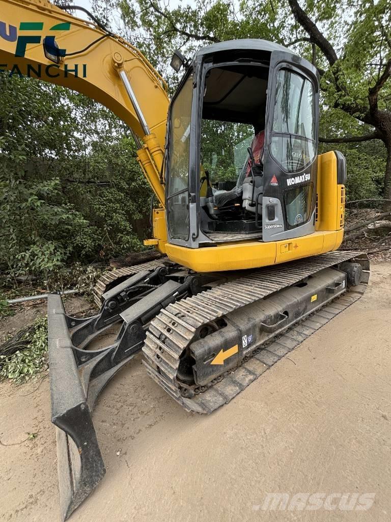 Komatsu PC128US Kāpurķēžu ekskavatori
