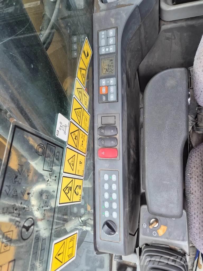 CAT M 318 F Ekskavatori uz riteņiem