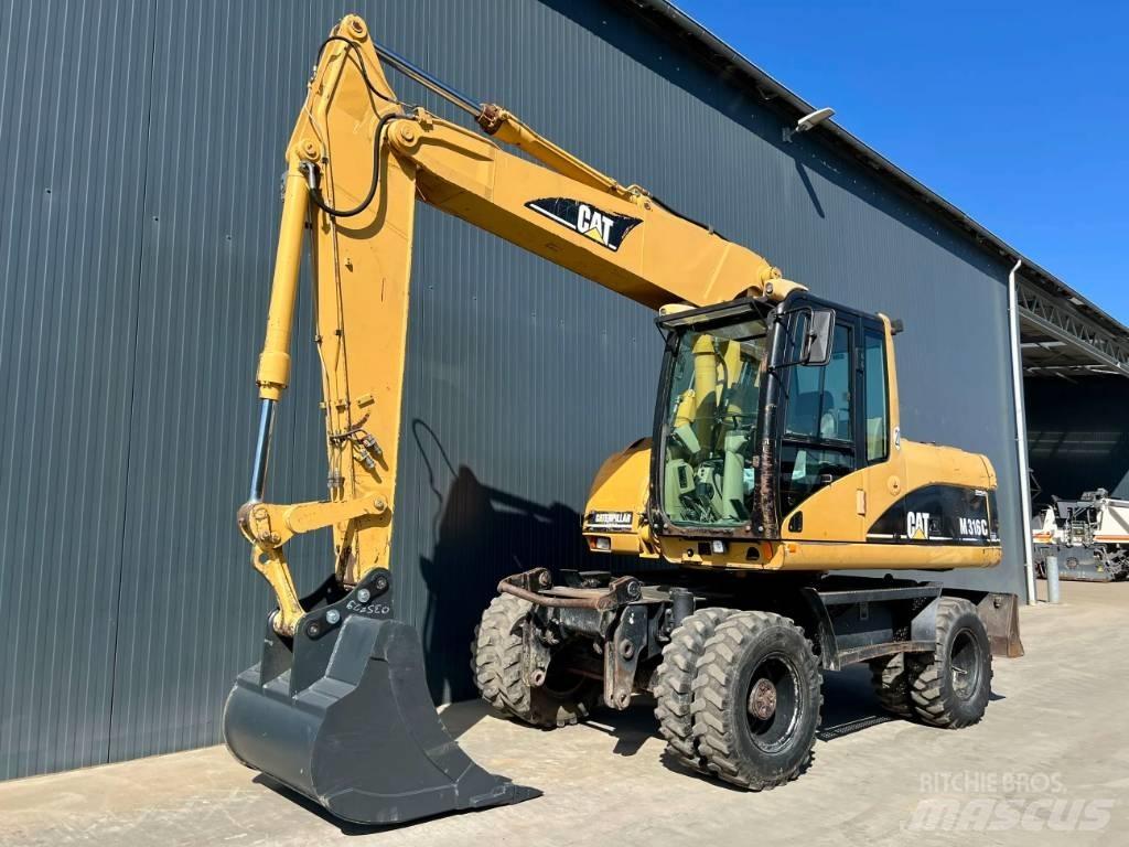 CAT M316C Ekskavatori uz riteņiem