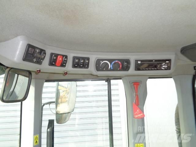CAT 938M Iekrāvēji uz riteņiem