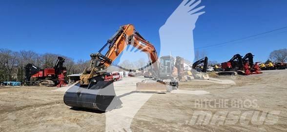 Doosan DX210W Ekskavatori uz riteņiem