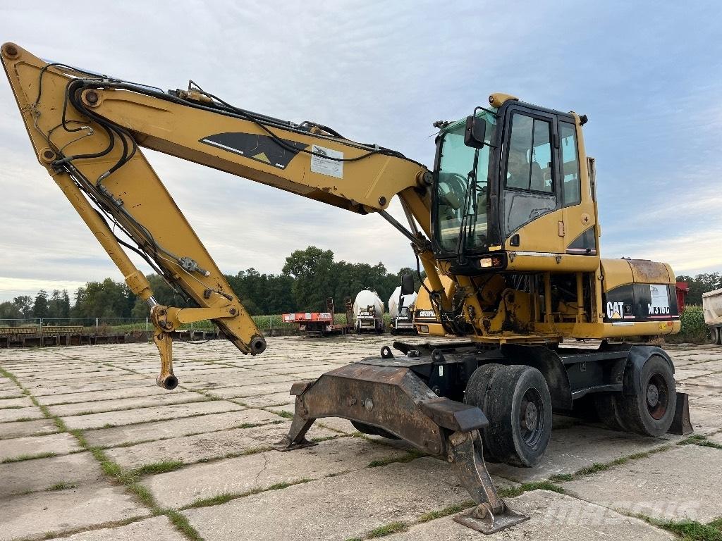 CAT M 316 C Ekskavatori uz riteņiem