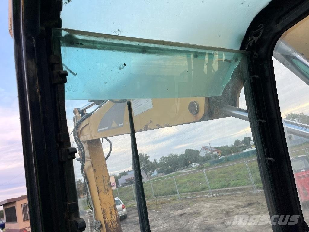 CAT M 316 C Ekskavatori uz riteņiem