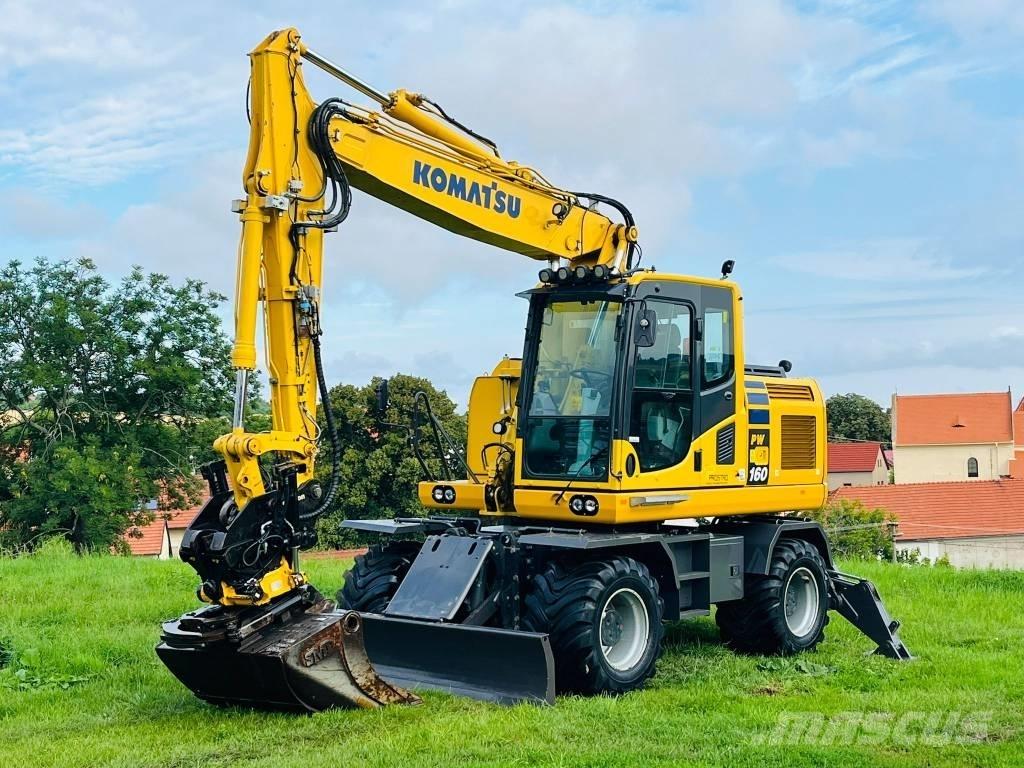 Komatsu PW 160 - 10 Ekskavatori uz riteņiem