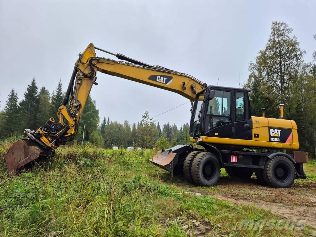 CAT M 316 D Ekskavatori uz riteņiem