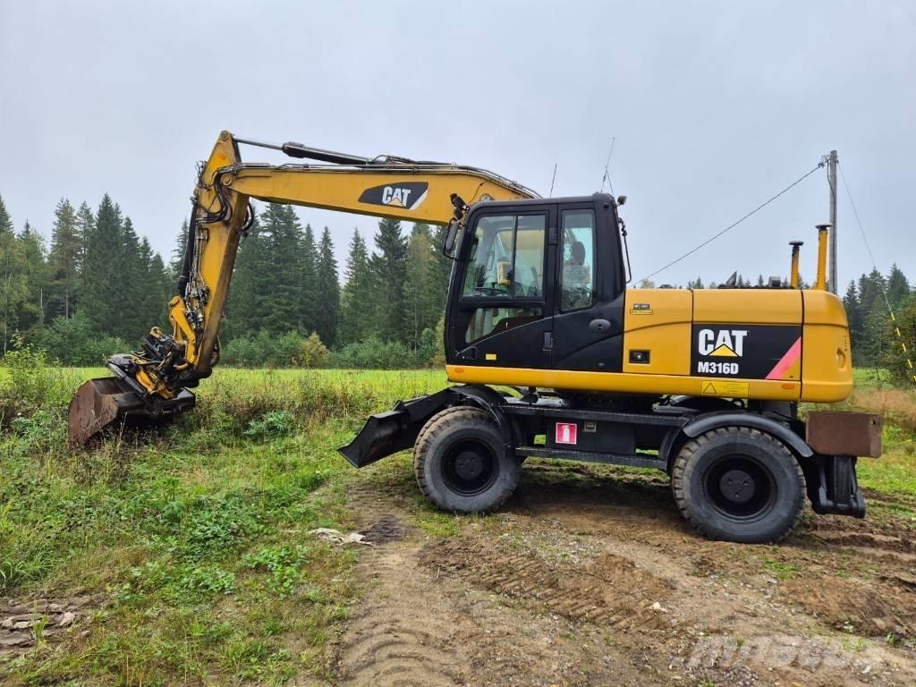 CAT M 316 D Ekskavatori uz riteņiem