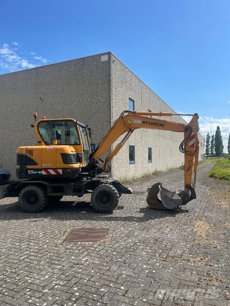 Hyundai 55w9a Ekskavatori uz riteņiem