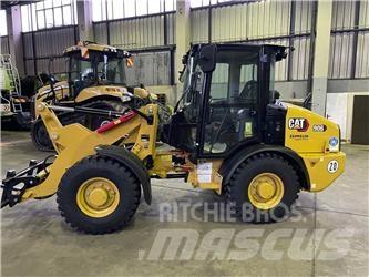 CAT 906 Iekrāvēji uz riteņiem