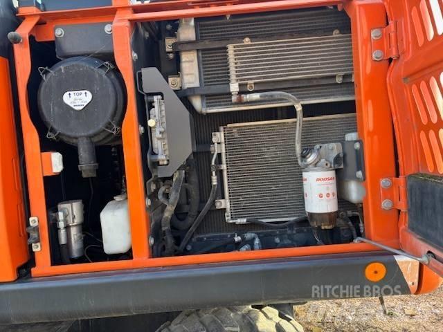  Dosan DX 140 Ekskavatori-iekrāvēji