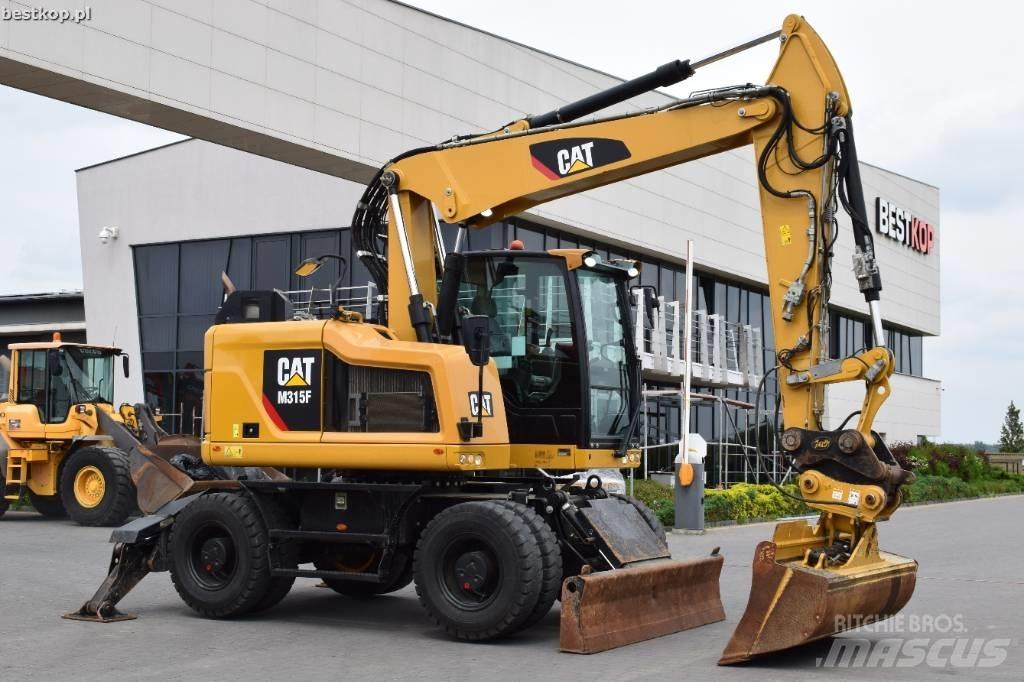 CAT M 315 F Ekskavatori uz riteņiem