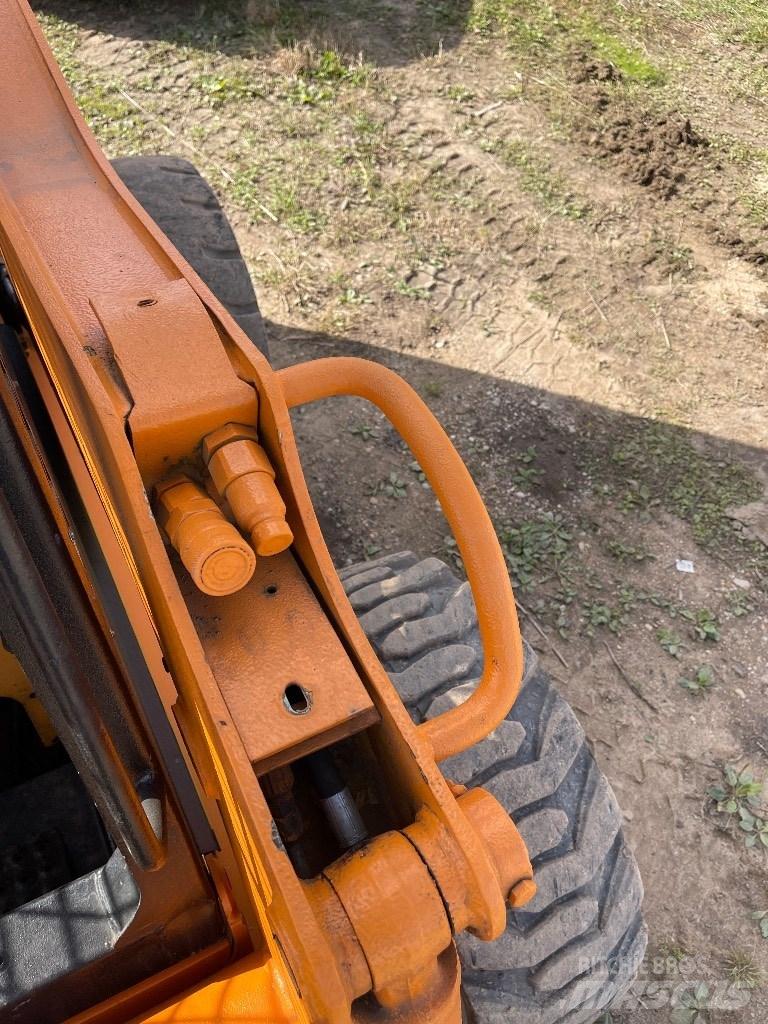 CASE 95 XT Lietoti riteņu kompaktiekrāvēji