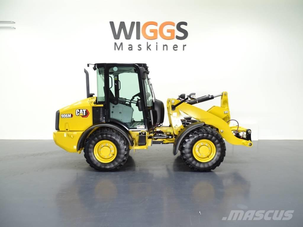 CAT 906M Iekrāvēji uz riteņiem