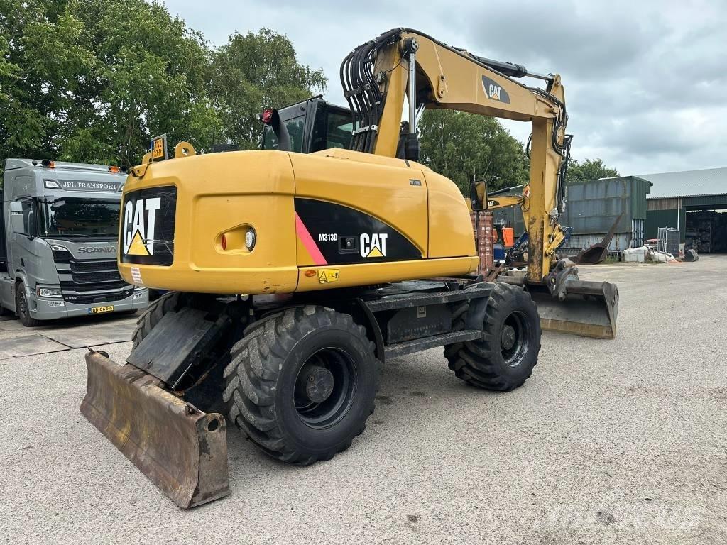CAT M 313 D - 13.285H Ekskavatori uz riteņiem