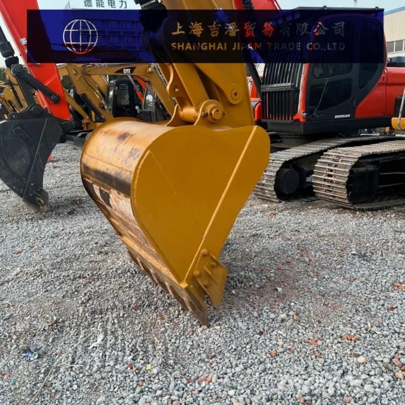 CAT 323 Kāpurķēžu ekskavatori
