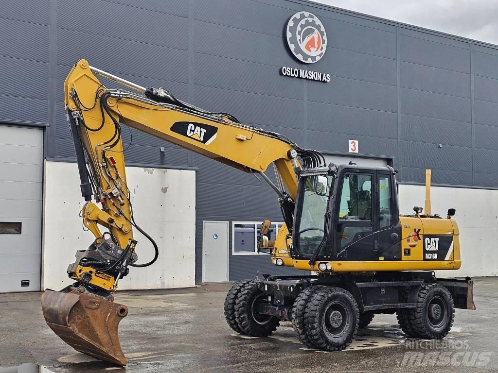 CAT M 316 D Ekskavatori uz riteņiem