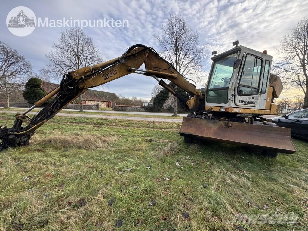 Liebherr A 310 B Ekskavatori uz riteņiem