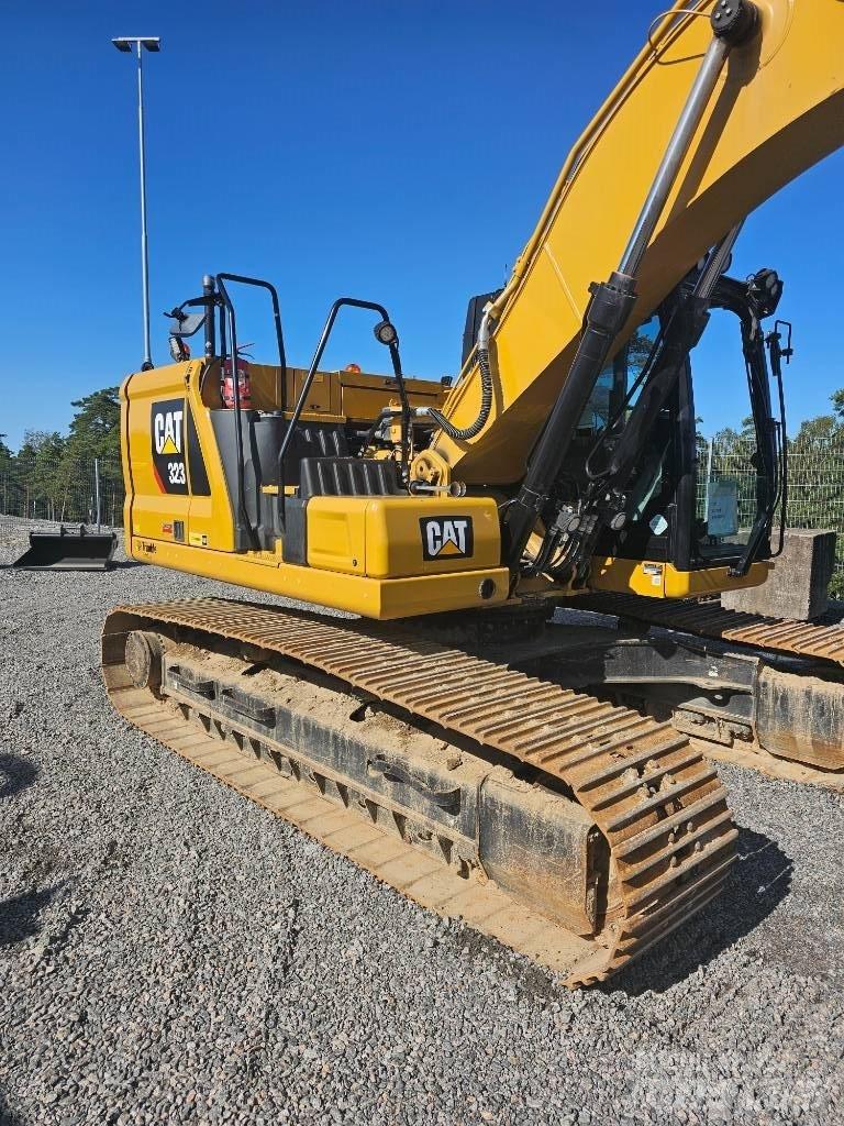 CAT 323 Kāpurķēžu ekskavatori