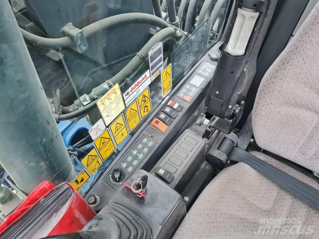 CAT M315D 2 buckets Ekskavatori uz riteņiem