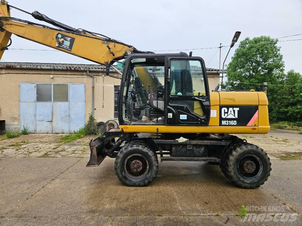 CAT M 316 D Ekskavatori uz riteņiem