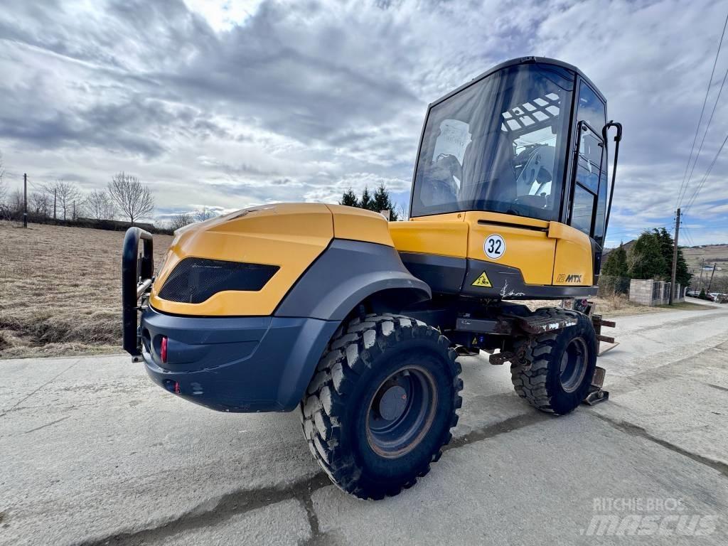 Mecalac 12 M TX Ekskavatori-iekrāvēji