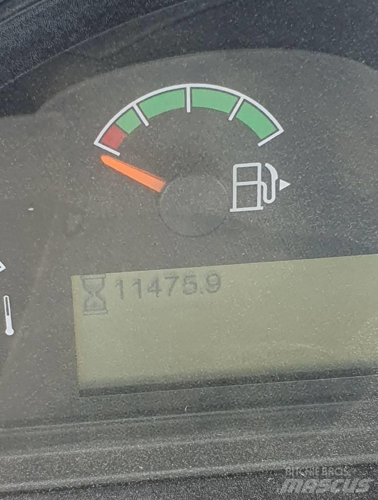 CAT 938M Iekrāvēji uz riteņiem