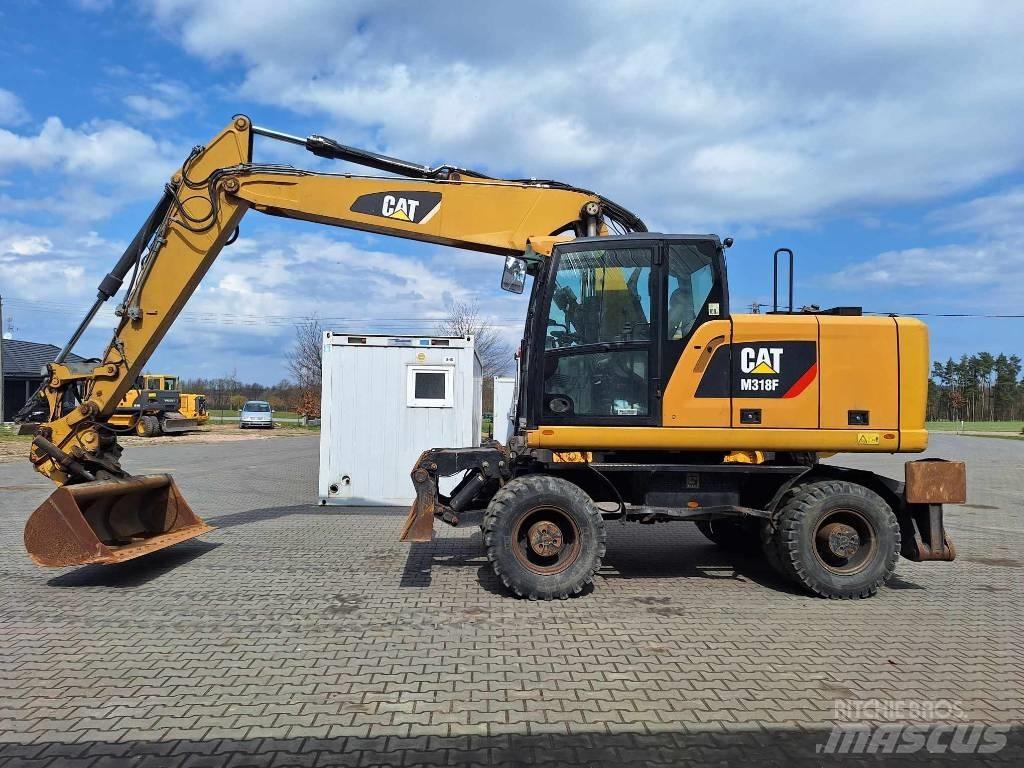 CAT M 318 F Ekskavatori uz riteņiem
