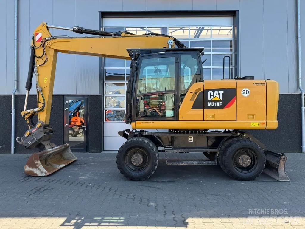 CAT M318F Ekskavatori uz riteņiem