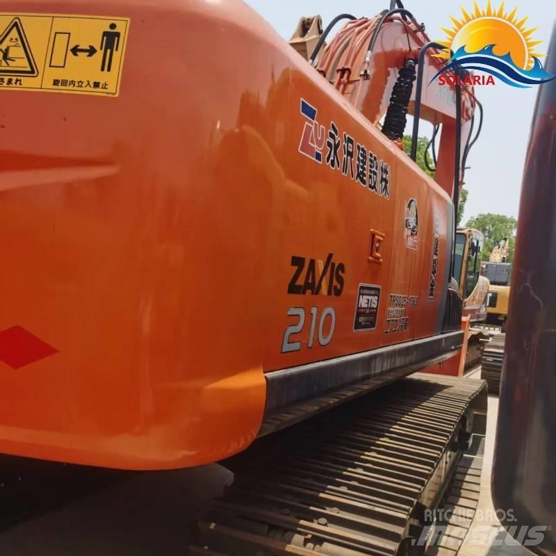 Hitachi ZX 210 Kāpurķēžu ekskavatori