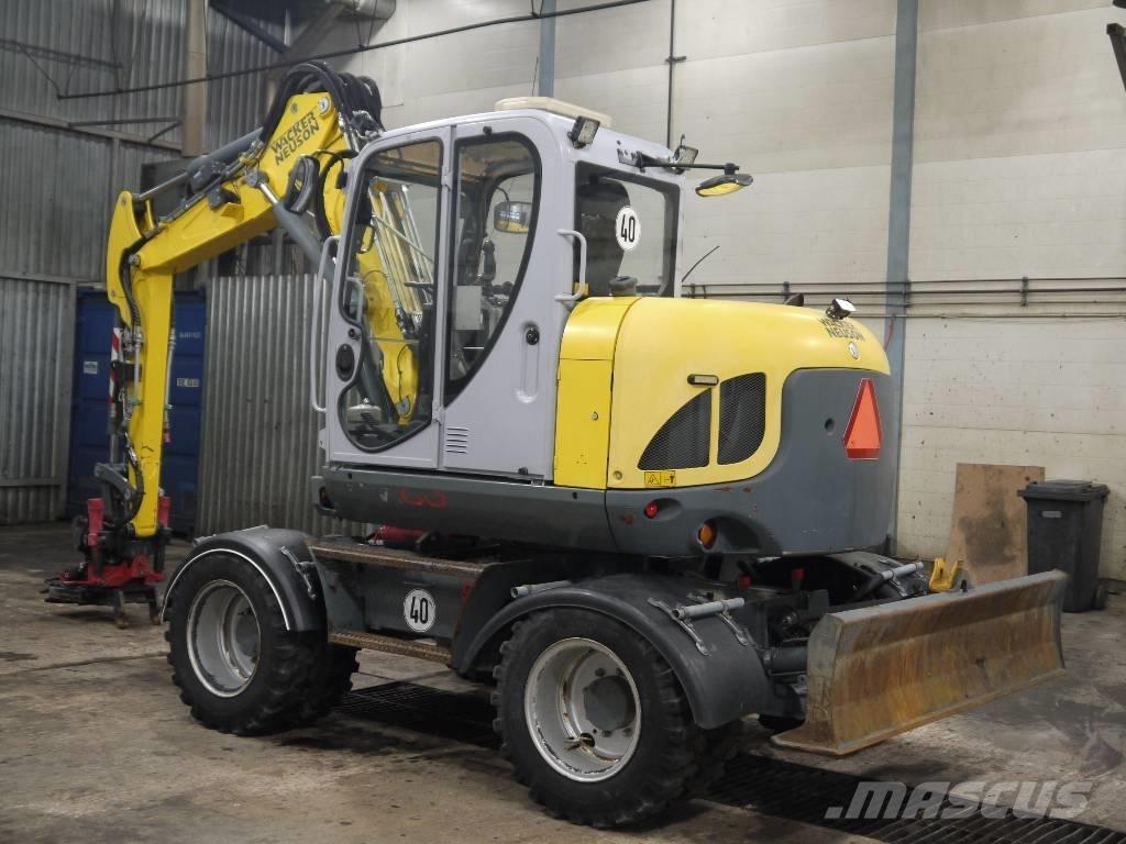 Wacker Neuson EW 100 Ekskavatori uz riteņiem