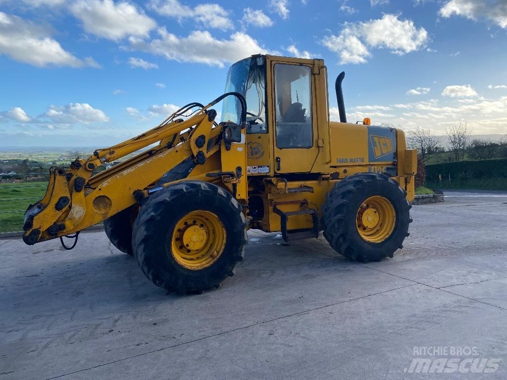 JCB 412 S Iekrāvēji uz riteņiem