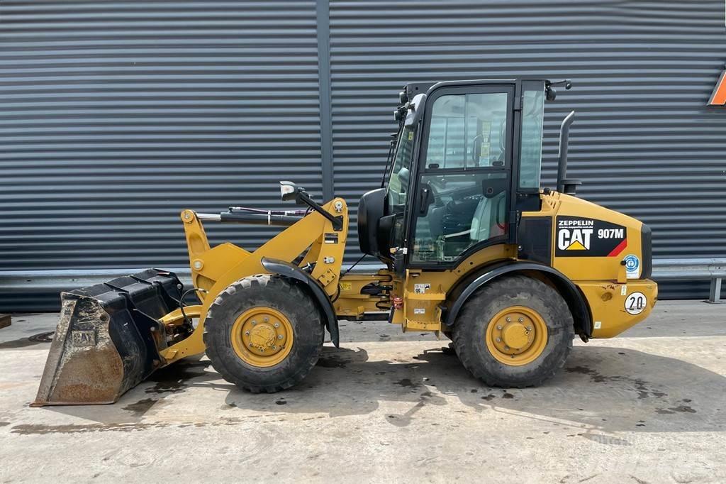 CAT 907M Iekrāvēji uz riteņiem