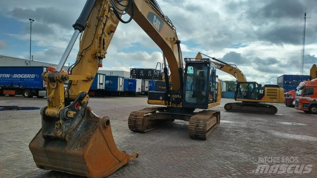 CAT 323 EL Kāpurķēžu ekskavatori
