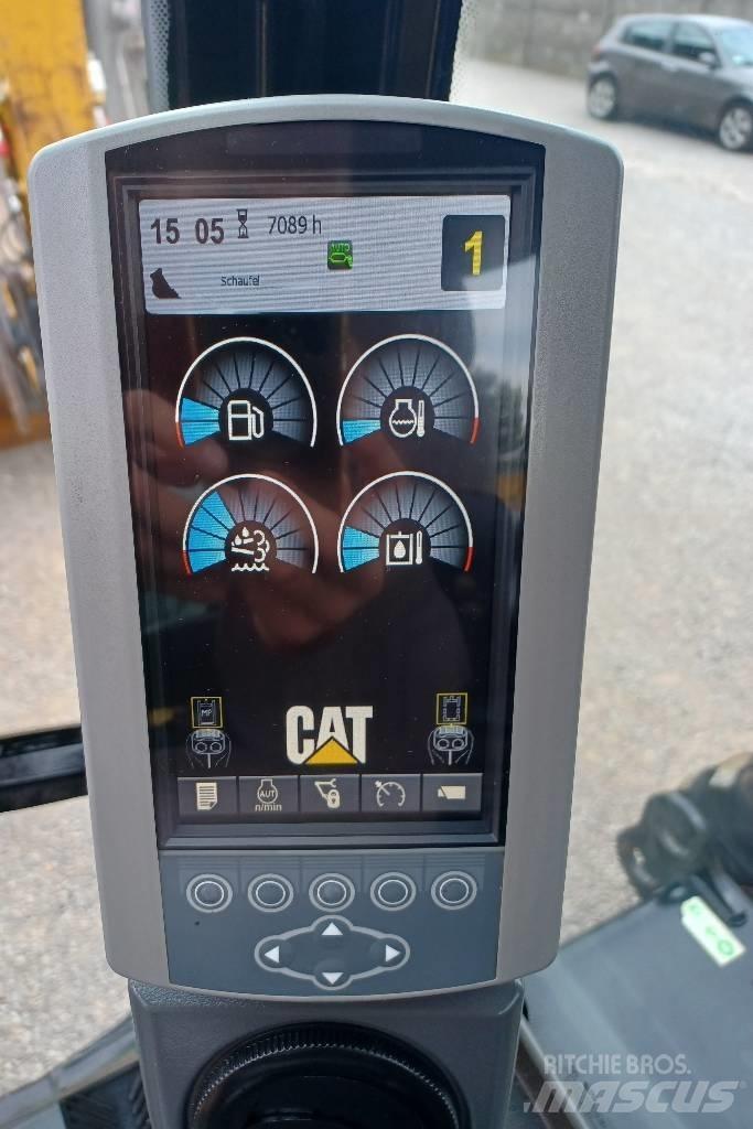 CAT 313 D Ekskavatori uz riteņiem