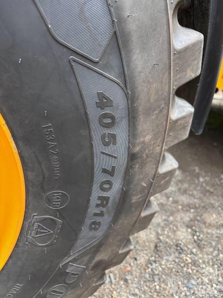 JCB 407 Iekrāvēji uz riteņiem