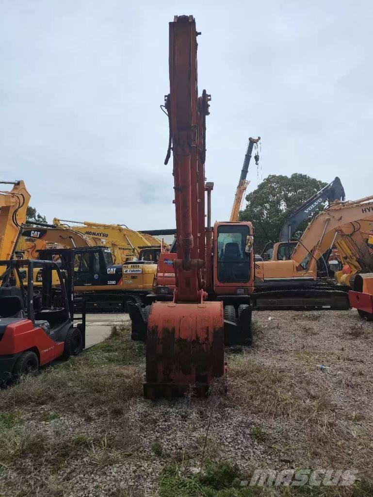 Doosan DH 210 W-7 Ekskavatori uz riteņiem