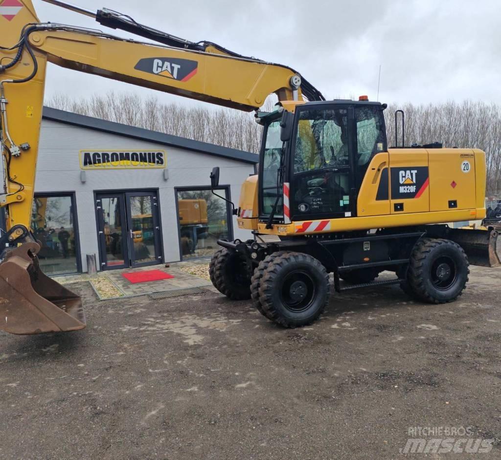 CAT M320 F Ekskavatori uz riteņiem