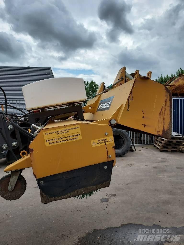 CAT 906/7/8 Ielu tīrīšanas mašīnas
