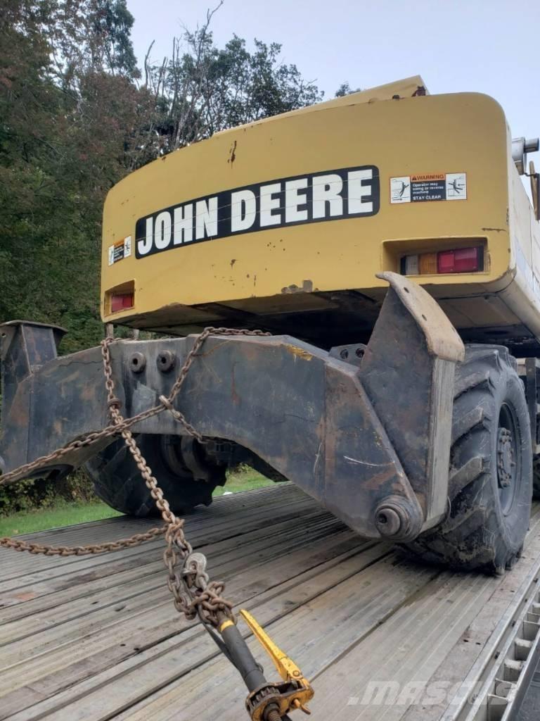John Deere 595D Ekskavatori uz riteņiem