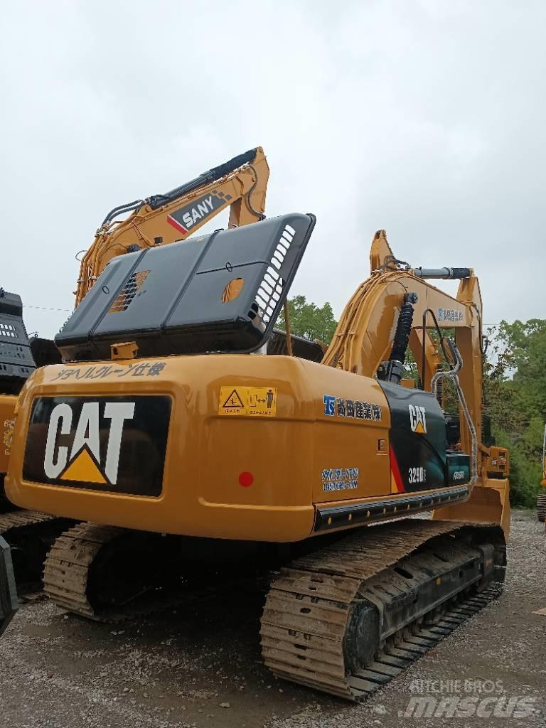CAT 329 D2 Vidēja lieluma ekskavatori 7 t - 12 t
