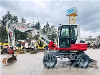 Takeuchi TB295W Ekskavatori uz riteņiem