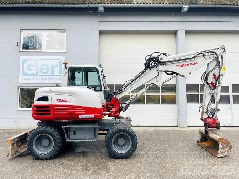 Takeuchi TB295W Ekskavatori uz riteņiem