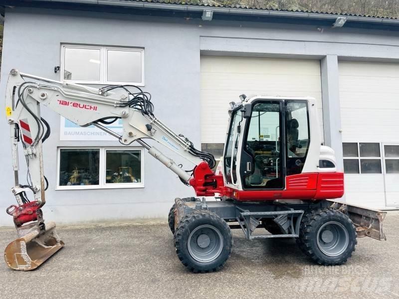 Takeuchi TB295W Ekskavatori uz riteņiem