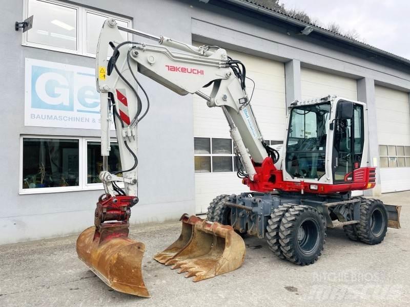 Takeuchi TB295W Ekskavatori uz riteņiem