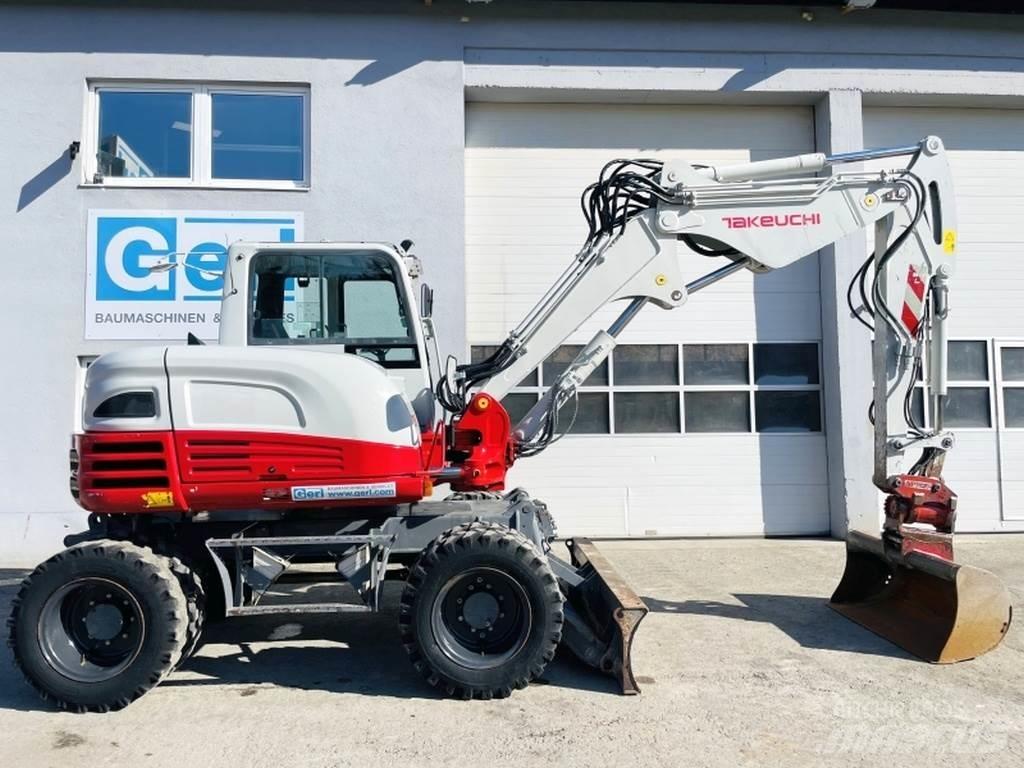 Takeuchi TB295W Ekskavatori uz riteņiem