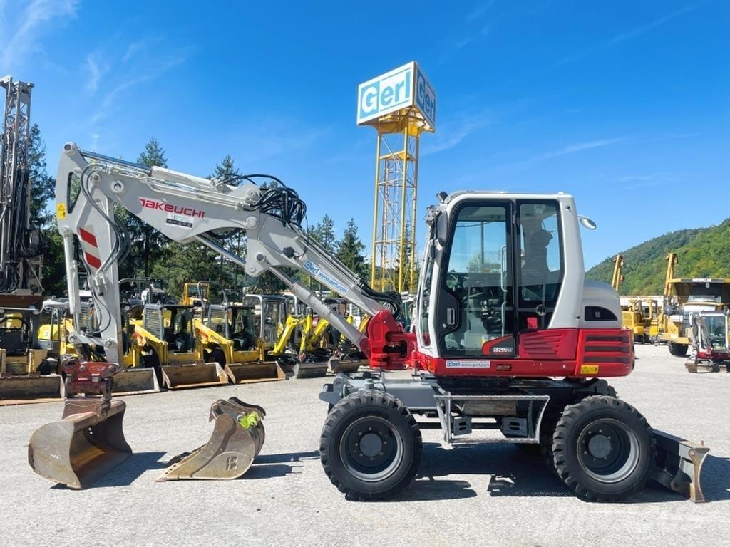 Takeuchi TB295W Ekskavatori uz riteņiem