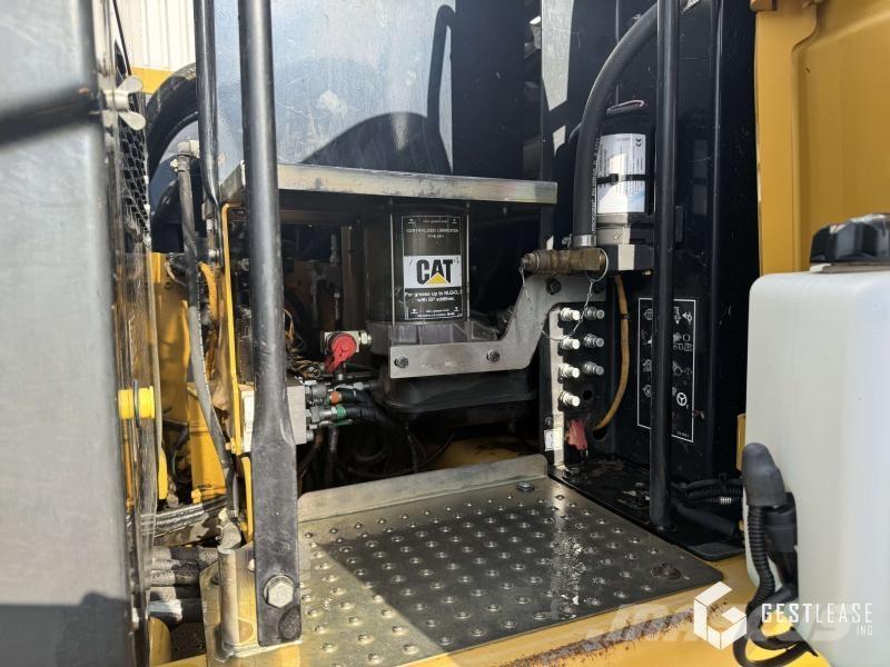 CAT M313D Ekskavatori uz riteņiem