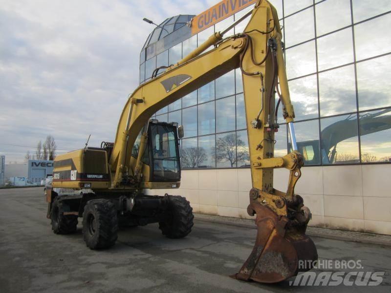 CAT M315 Ekskavatori uz riteņiem