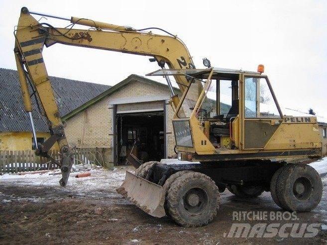 CAT 212 til ophug Kāpurķēžu ekskavatori